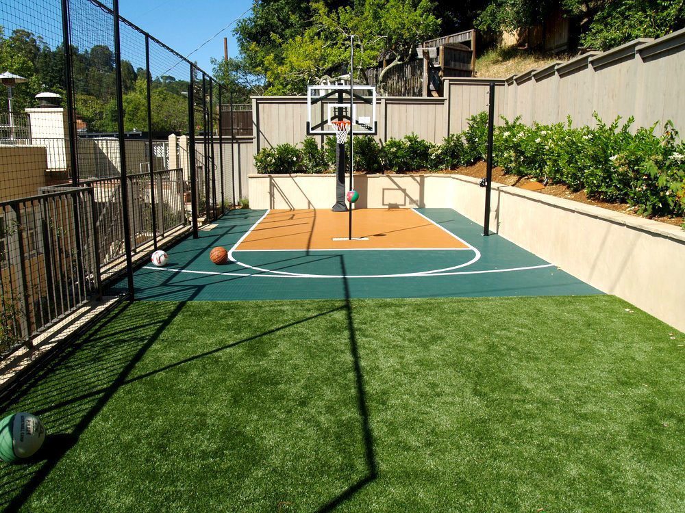 Artificial grass for an activity area with a sport court.