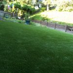 Synthetic turf & sod in a backyard (after)
