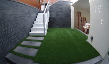 Artificial synthetic turf installed in three areas in a residence in San Francisco, California.
