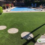 Artificial grass backyard around the pool in San Rafael, California