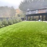 Fake grass installation in residential back yard, Mill Valley, Marin County, California