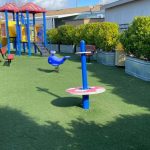 Fake grass playground installation - 10 years old