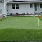 How do you maintain artificial grass?